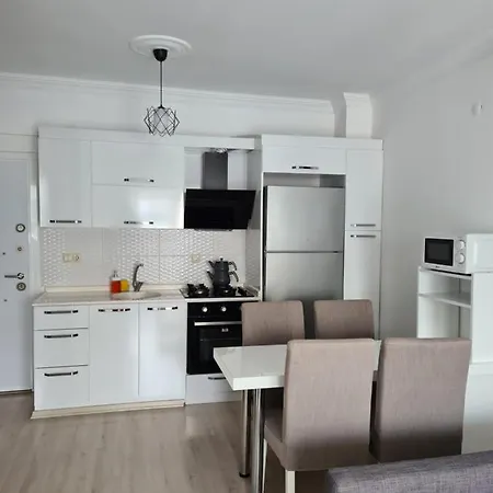 아파트 1+1 в сите с басейном 쿠사다시